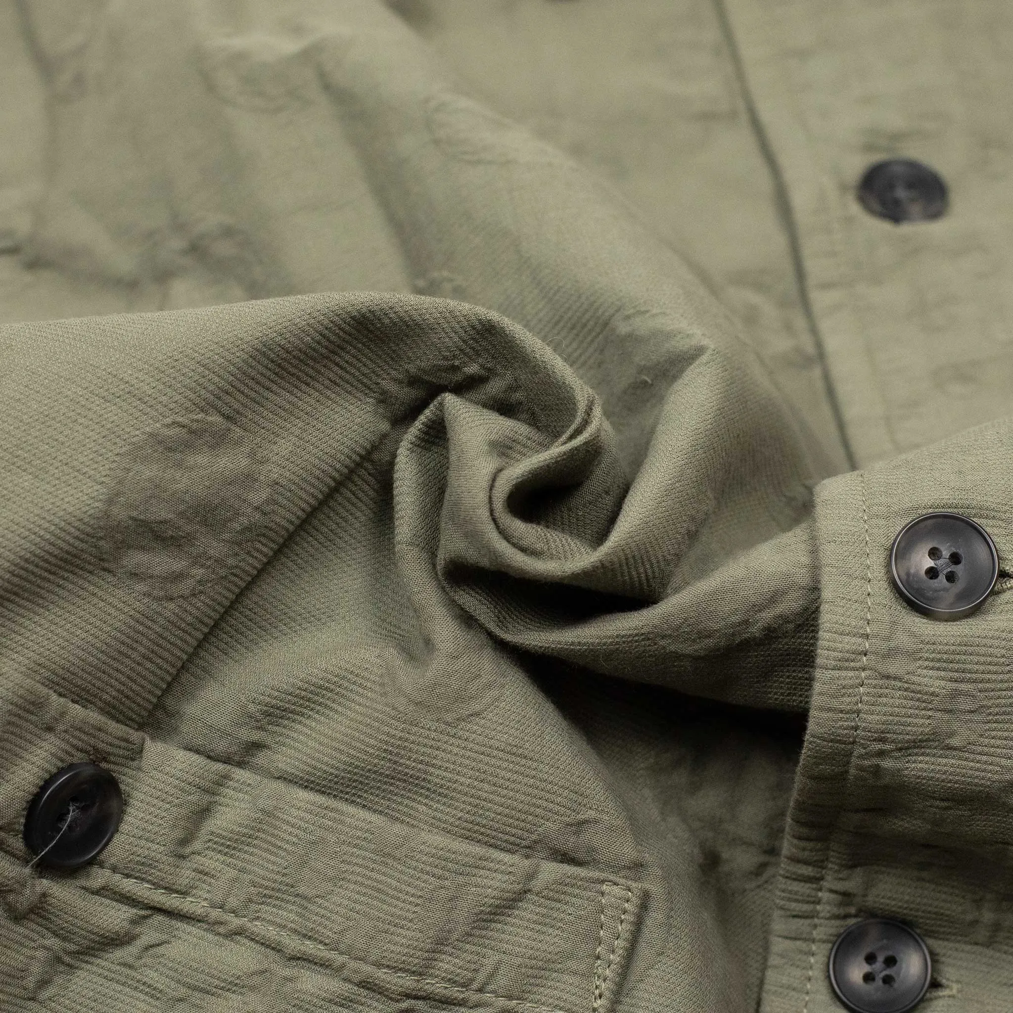 Short sleeve shirt in olive cotton patchwork dot jacquard